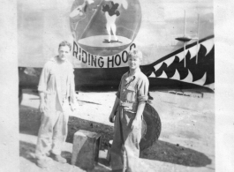 Flyers Bill Lesak and Sam Hansen with B-24 "Red Hot Riding Hood," in the CBI during WWII.  "B-24s in my squadron."