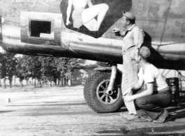 Nose art and camera port on F-7A/B-24 "Nasty Lil," serial #42-64055. 24th Combat Mapping Squadron, 8th Photo Reconnaissance Group, 10th Air Force.
