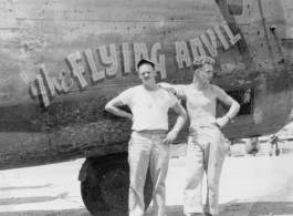 Flyers stand before F-7A/B-24 "The FLYING ANVIL."  24th Combat Mapping Squadron, 8th Photo Reconnaissance Group, 10th Air Force.