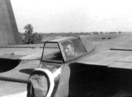 Jim Lane in tail gun (.50 cal.) put in B-25 #81, summer of 1943, Chaukulia, India.