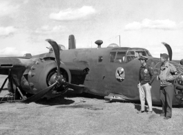 A B-25D of the 22nd Bomb Squadron 'Bombing Eagles' of the 341st Bomb Group rests down on its belly at an airfield in Kunming, China, February 3, 1944. This wrecked B-25 Mitchell should be B-25D-15, #41-30385.   Major Weatherly, the pilot, surveys the crash damage, as does and MP. At the base of the wing is a dark area: damage caused by hitting a ship’s mast during a strafing run (and causing this crash). More information about Major Weatherby and this crash can be seen here.  (Thanks for the research and in
