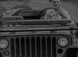 Ira Reiber driving a jeep in Dushan, Guizhou province (贵州省独山) during WWII in the CBI. 1945.