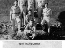 Base HQ staff pose on steps for a photo in the CBI during WWII.