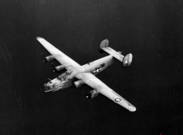 The B-24 bomber "80 Days" in flight.
