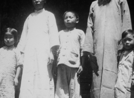 A "village host" family in SW China during WWII, probably Tengchong.