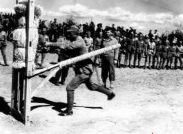An American instructor working with Chinese troops on the bayonet during WWII.