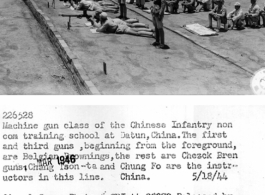 Machine gun class of the Chinese Infantry non com training school at Dutan, China.  The first and third guns, beginning from the foreground, are Belgian Brownings, the rest are Chezck Bren guns.  Chang Tson-ta and Chung Fo are the instructors in this line. China. 18 May 1944