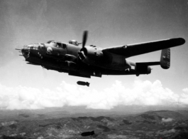 A B-25J of the 491st Bomb Squadron, drops bombs on a target somewhere in SW China or Burma. Named "Niagra's Belle", the squadron assigned combat id number '439' is visible on the tail and on the nose.