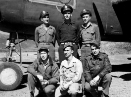 Unidentified aircrew of the 491st Bombardment Squadron (Ringer Squadron) stand beside aircraft "43-4481", a B-25H, at Yangkai Air Base, China. The squadron assigned, combat id number is painted on the nose wheel, '81'.