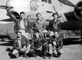 At Yangkai, China, posing with the B-25H "Wabash Cannonball", are air crewmen of the 491st Bomb Squadron. In front are T/Sgt Michael F. Hassay (flight engineer), T/Sgt John F. Daley (radio), and S/Sgt Kurt E. Hemrick (gunner). Behind them stand Lt. Frank S. Burgess (pilot), Lt. Farlie A. Garner (copilot), and Lt Gordon P. Edwards (bombardier).