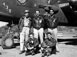 An air crew of the 491st Bomb Squadron pose in the revetment with B-25J #439, "Niagra's Belle", at Yangkai, China. Sitting are T/Sgt Henry P. Albro (radio) and S/Sgt Arquimidas L. Matos (gunner). Standing are (l-r) Lt. Seymour Mazer (navigator), Lt. Eric M. Hexburg (pilot) and S/Sgt Frank A. Koncolics (flight engineer).