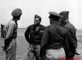 Col. Clark (far left) and Claire Chennault (middle) at Yangkai, February, 1945, during decoration formation.