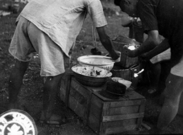 September 28, 1944  During WWII, food sellers from Liuchow, China, set up stands to cater to the hungry refugees from Kweilin (Guilin) escaping the Japanese drive into southwest China.  Photo by Lt. N. J. Dain