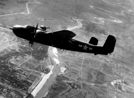 Chinese American Composite Wing (CACW)--1st Bomb Group B-25 #43-4903 after bombing Wuhu.