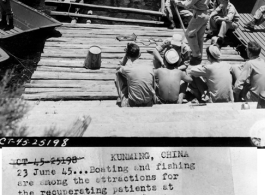 June 23, 1945  Boating and fishing are among the attractions for the recuperating patients at the Convalescent Camp #3 at Kunming, China, the only one of its kind in the China Theater.  Army boats have been provided, as well as home-made airplane tank scooters for the aquatic enjoyment of the patients.  During WWII.  AKA: "Camp Schiel"
