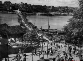 Looking north across the floating bridge at Liuzhou city, Guangxi province, China, near the US Airbase during the Second World War.  Selig Seidler was a member of the 16th Combat Camera Unit in the CBI during WWII.