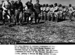 Troop review in Burma between Chinese and American officers and troops in 1945. Lt. Daniel I Sultan and Gen. Wei Li-huang return a salute as they review Chinese troops from Burma and China near Muse, China, after clearing Japanese troops from the Stillwell Road. 