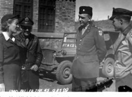 A "Red Cross girl" and American officers chat on a street in Kunming during WWII, on January 2, 1945. In the background is a jeep for ATC. 1340th AAFBU ATC Kunming China.  Photo from R. Heinmann.