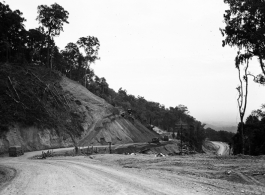 US military transport trucks wind along the Ledo Road, Burma, during WWII.