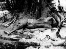 A man sleeps under a banyan tree in India during WWII.  In the CBI. Photo submitted by Glenn S. Hensley, Kirkwood, MO.