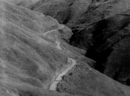 Lonely, winding section of Burma Road near the Salween River in southwest China, during WWII.  Photo by George Pollock.