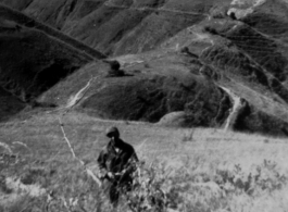 Fuel pipeline from India snakes over hills in SW China during WWII.   George E. Pollock.