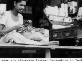 Indian man makes cigarettes by hand in India during WWII.  Photo from Kenneth M. Sumney.