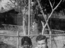 John Turner and waif outside of a Jorhat, India, restaurant, during WWII.