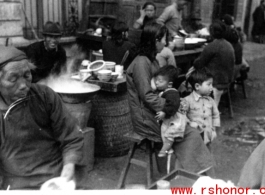 Sidewalk eatery in Chongqing during WWII. In the CBI.