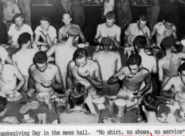 Thanksgiving meal in mess hall in the CBI, apparently in a location that was hot. During WWII.