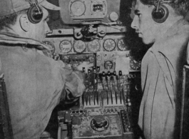 Flyers in a cockpit in the CBI during WWII.