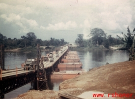 A floating or pontoon bridge in the CBI, probably part of road transport into China from Burma/India.