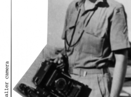 Bob Lichty shows off his Speed Graphic camera which he carried in the CBI before switching to a smaller camera.