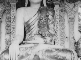 Smiling Buddha near Bhamo, Burma, during WWII.