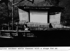 Lone GI has a long time to wait for the show to start at this typical outdoor theater in the CBI during WWII.