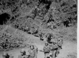 Mars Task Force, 124th Cavalry Regiment, marching in Burma on Christmas Day, 1944. In the CBI during WWII.  Photo from Dwight Burkam.