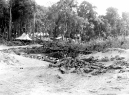 9th Photo Detachment tent camp near the air strip at Tingkawk, Burma, in August, 1944.  Photo from Philip Eichen.