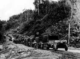 Monsoon landslide halts convoy on Burma-Stilwell Road. In the CBI.  U. S. Army Photo.