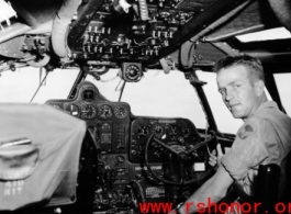US serviceman in cockpit of transport aircraft. In the CBI during WWII.
