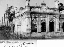 Bombed out Burmese buildings near Sahmaw, Burma, during WWII.  Photo from C. J. Sloanaker.