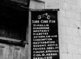 A sign for a cure-all doctor in Calcutta during WWII.  Photo from Robert Lichty.