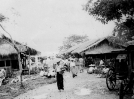 Market area in Bhamo, Burma. Photo by Sgt. Jesse D. Newman, 988th Signal Service Battalion.  In the CBI during WWII.