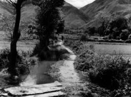 Trail and canal in countryside of SW China during WWII.