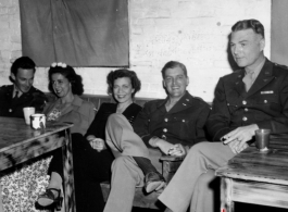 Officers and ladies relax in the CBI during WWII, during a party and dance at the Hostel #10 Officer's Club on January 19, 1945.