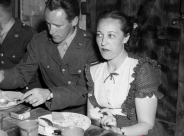 People eating at a party and dance at the Hostel #10 Officer's Club on January 19, 1945.  Photo from Dorothy Yuen Leuba.