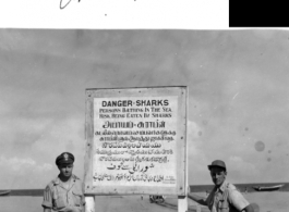 A crew of American GIs in front of a sign at Madras, India, during WWII, including Sandler (radio), Bell (Crew Chief), Lt. Miller, Capt. Conrad, and George Zdanoff.  Photo from George M. Zdanoff.