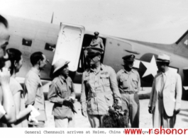 Chennault disembarks from a C-46, #476439, in Xi'an, China, to say farewell to the troops in 1945.