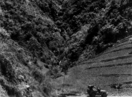 Jeep on road north of Kunming, May 1945.