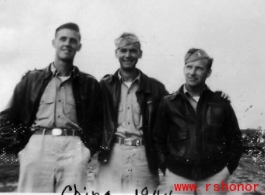 Flyers Folke Johnson, Edward Price, and Paul Hunt, members of the same B-24 bomber crew, pose together in China in 1944.
