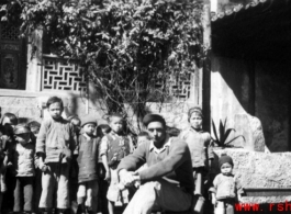 Chinese school room and pupils. "We couldn't get the teacher to pose." Frank Bates, Spring 1945  From the collection of Frank Bates.
